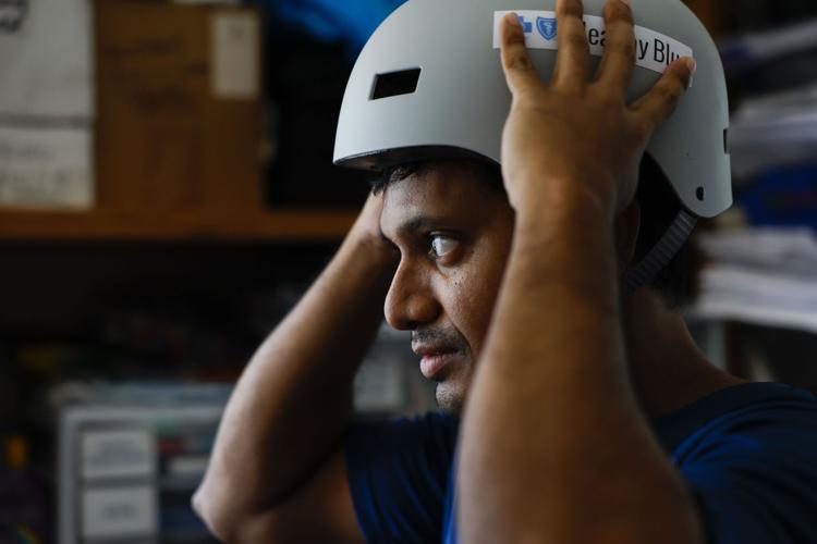 Bike Easy and Blue Bikes promote safety with helmet giveaway