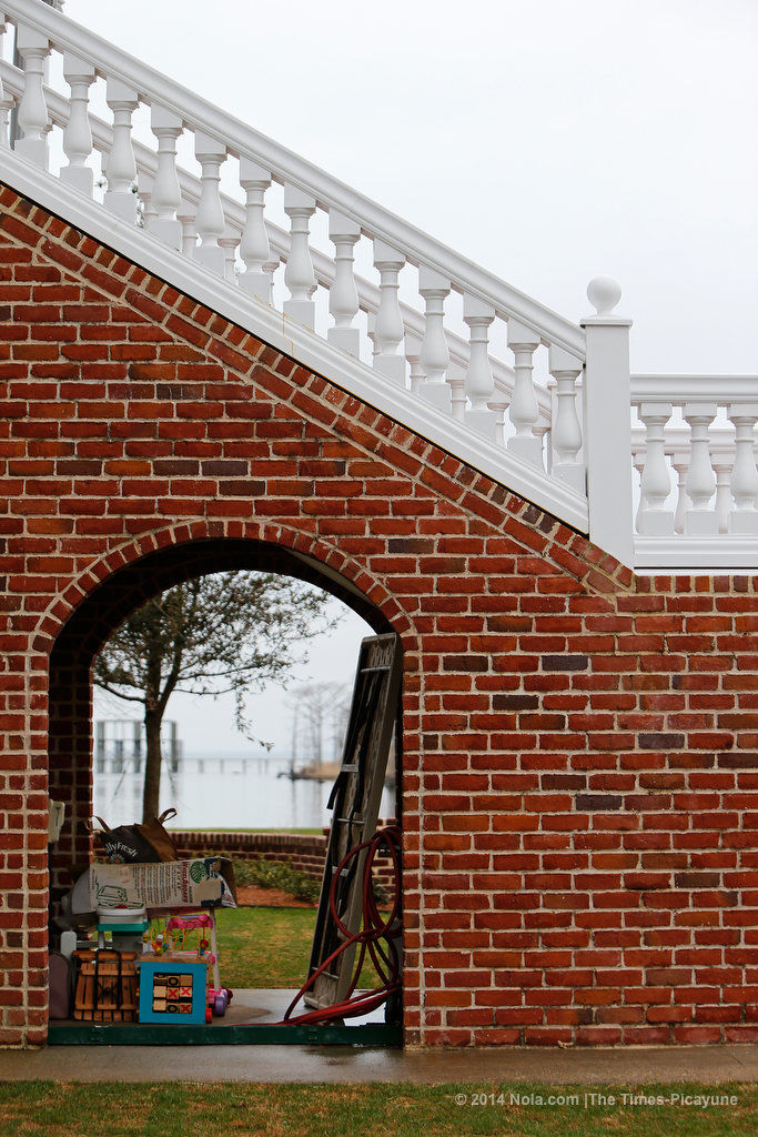 On the shores of Lake Pontchartrain, a Mandeville home sits on land