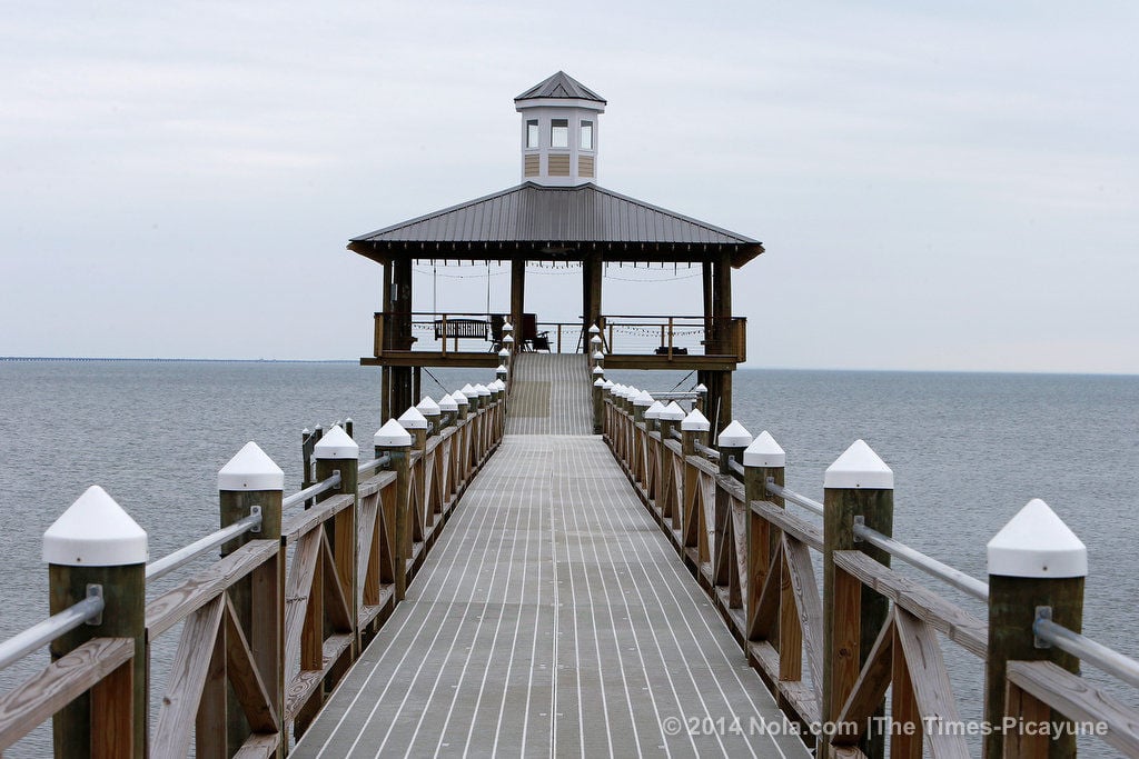 On the shores of Lake Pontchartrain, a Mandeville home sits on land