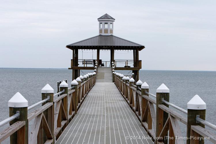 On the shores of Lake Pontchartrain, a Mandeville home sits on land