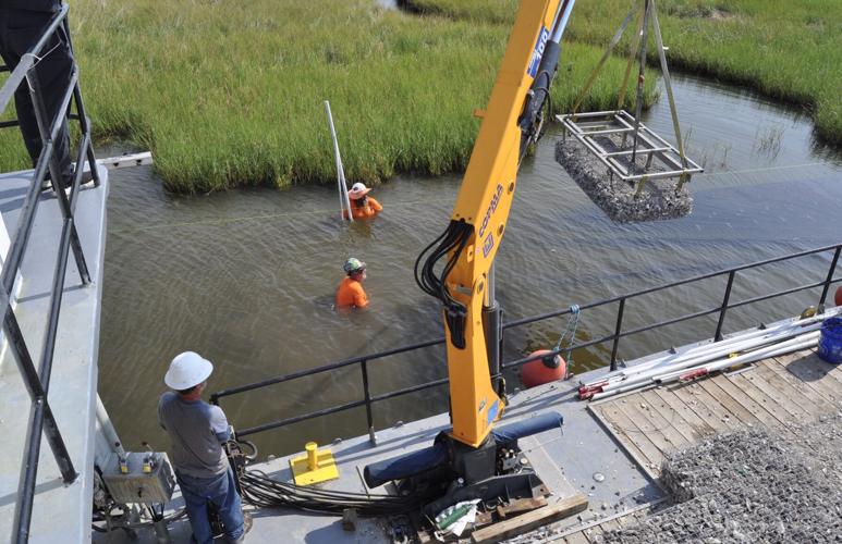 Hoisting oyster shell blocks