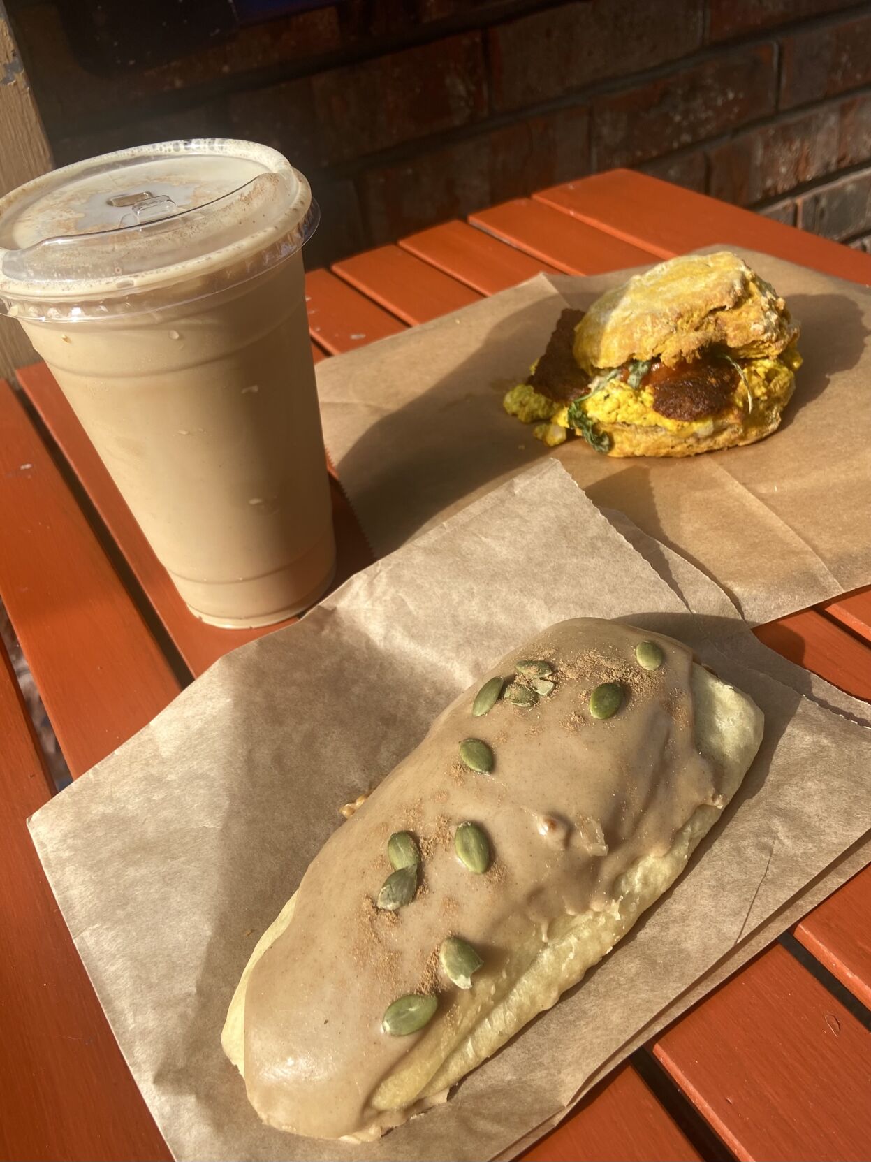 Biscuits, latte and brioche make up a pumpkin spice trifecta at Breads