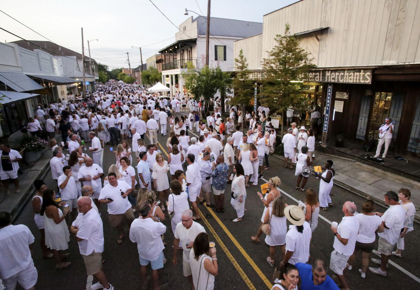 Photos Thousands attend Covington's White Linen for Public Art event