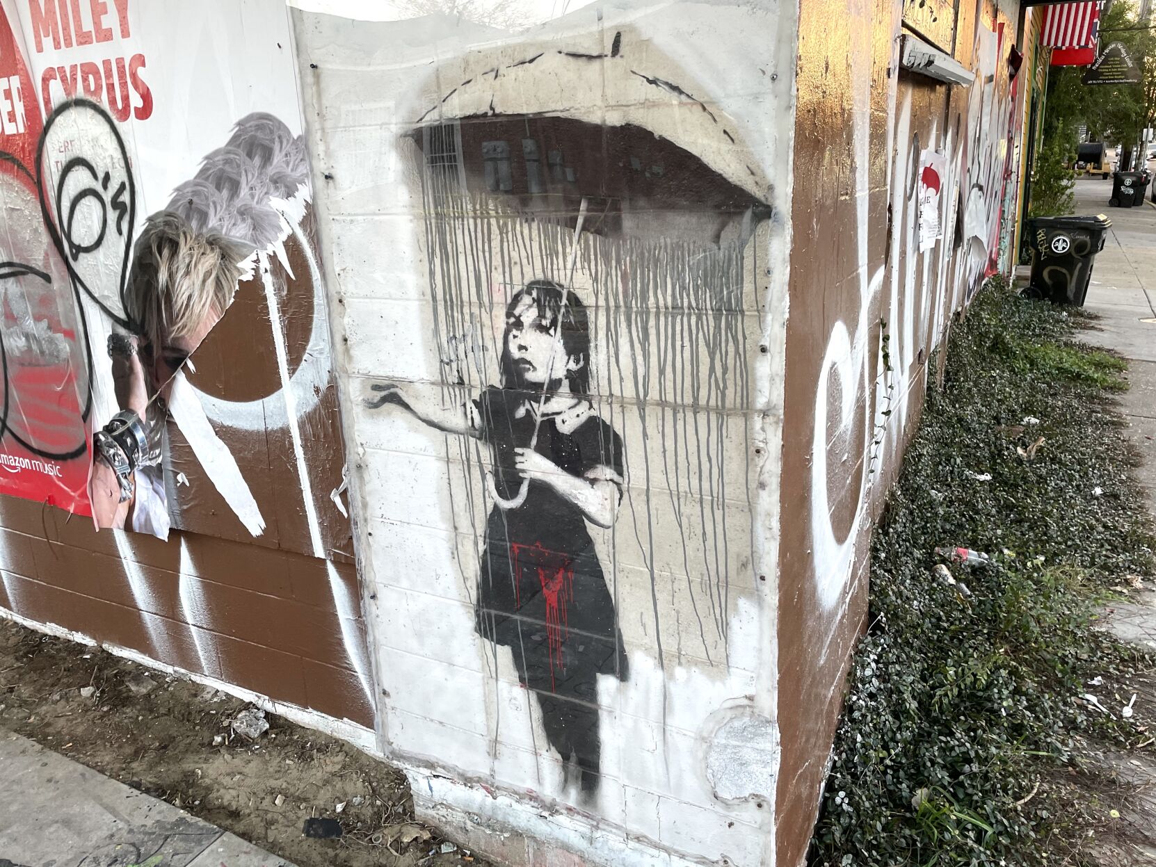 Vandalized Banksy graffiti painting in New Orleans is restored by