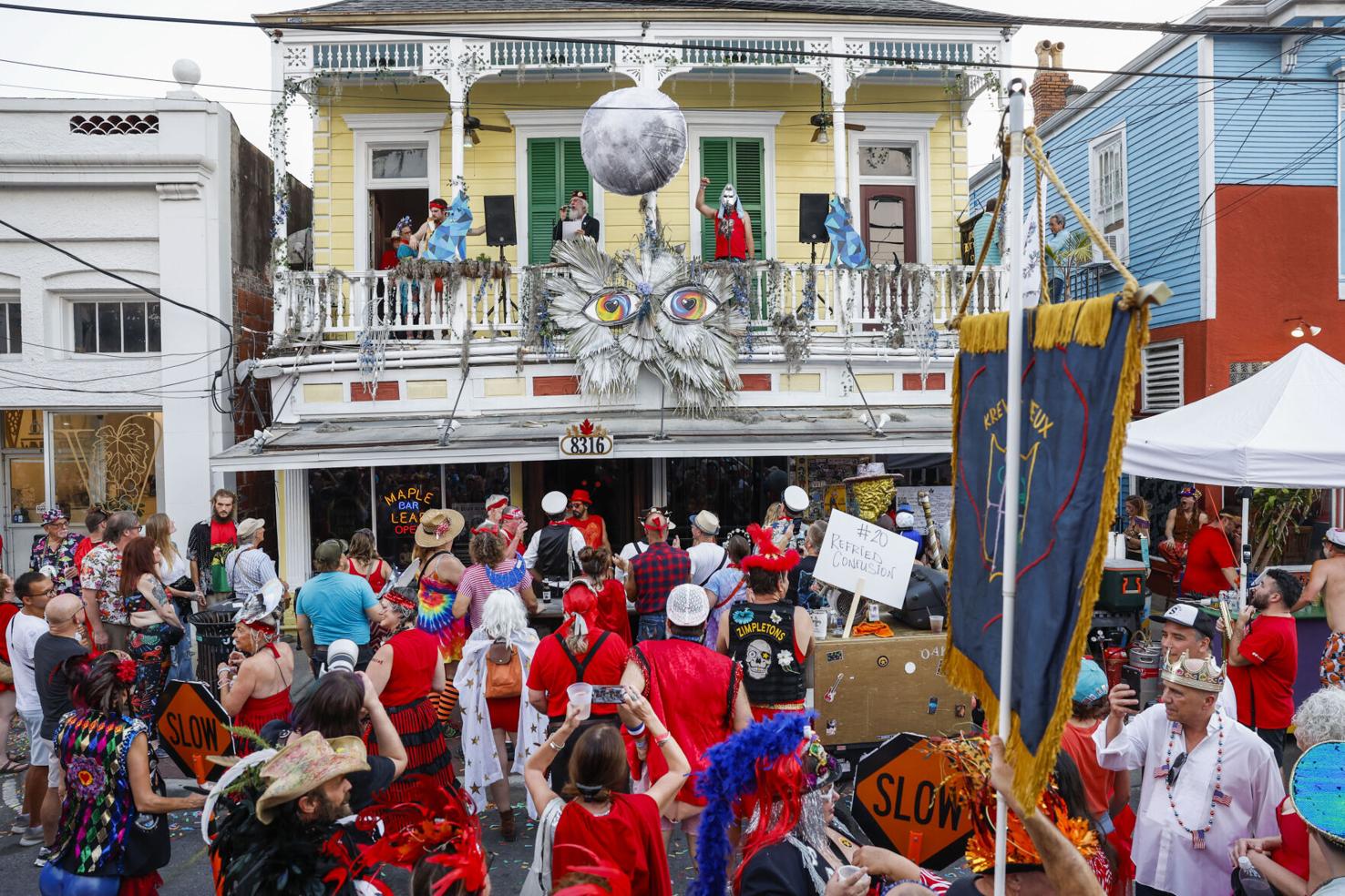 Midsummer Mardi Gras marches to the theme Blue Moon Rising Photos