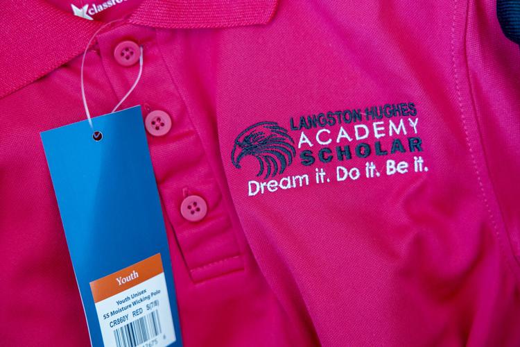 As more New Orleans families struggle to buy school uniforms, one group