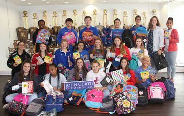 John Curtis fills backpacks for hurricane victims | Archive | nola.com
