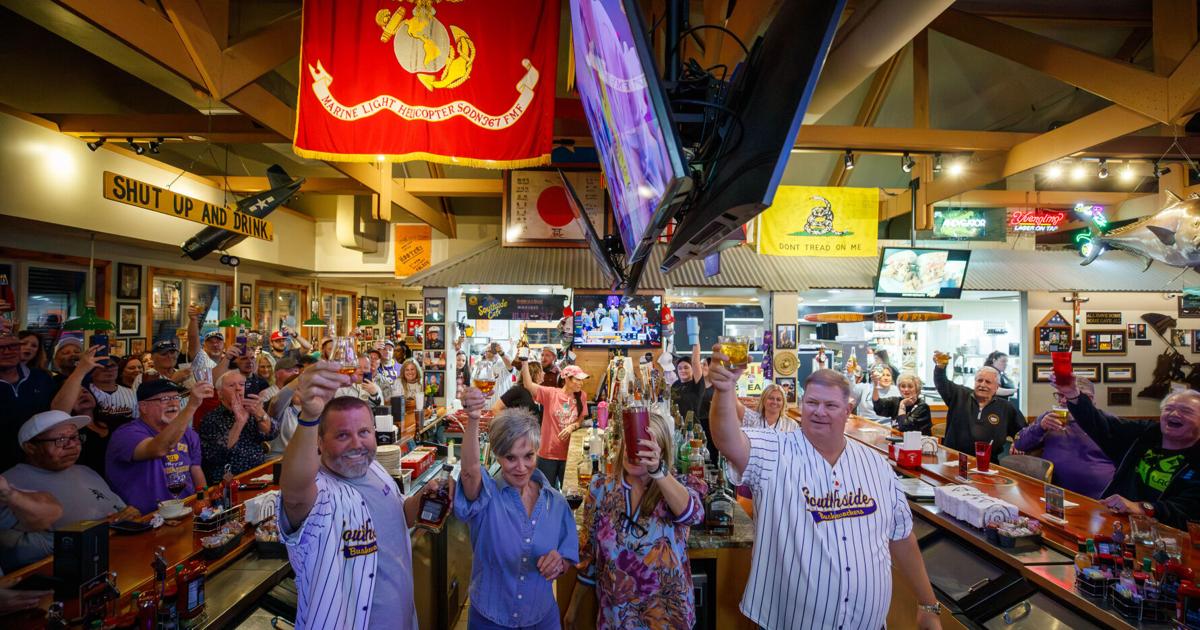 Jack Daniel's in hand, friends gather for a farewell toast to a popular ...
