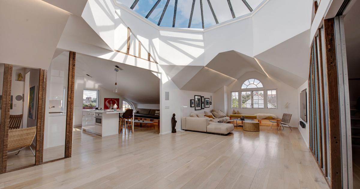 A central skylight and palladian windows put a penthouse condo in the ...