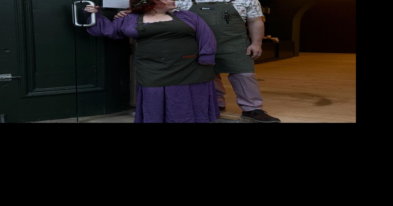 Deanna Holdcraft and Paul DeSana serve coffee, tea and house-baked goods at Witches Brew