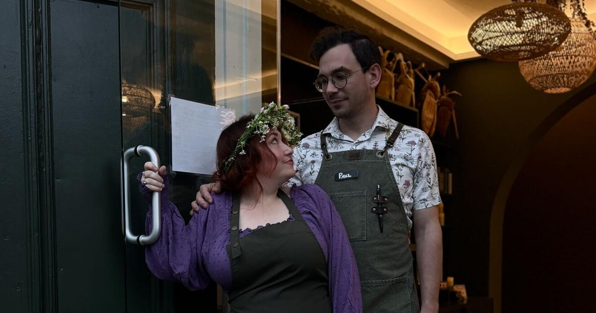 Deanna Holdcraft and Paul DeSana serve coffee, tea and house-baked goods at Witches Brew