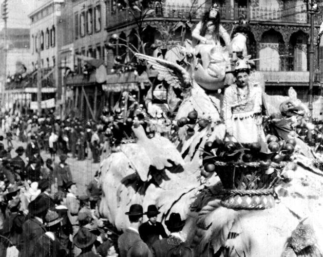 The theme of the 1898 Rex parade was Harvest Queens, with floats representing bountiful displays of fruits and vegetables 1898 parade film, riders are seen on the Cherries float.jpg