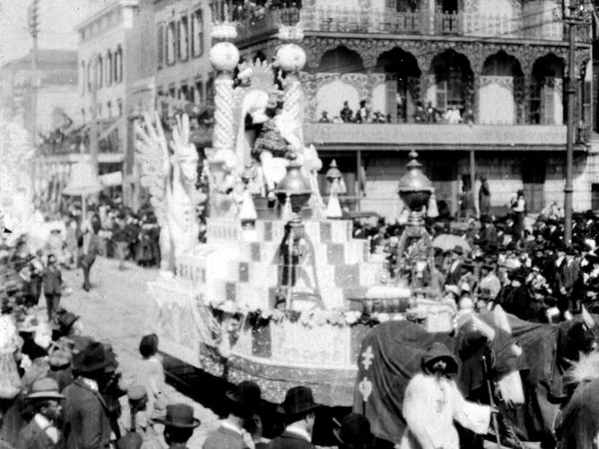 This still photograph taken from the 1898 Rex film shows the King of Carnival, Charles A. Farwell, riding atop the royal float.jpg