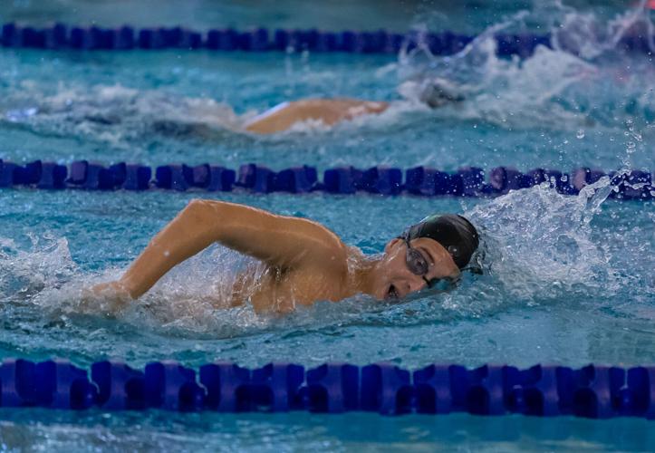 Pope John Paul dedicates swim success to Christian Tullis Prep Spo picture