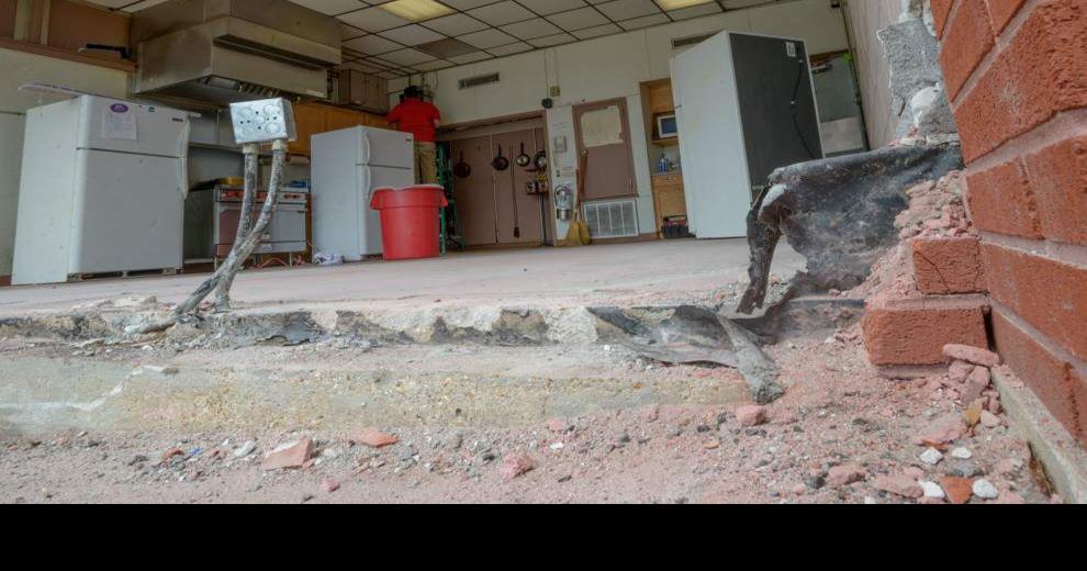 Truck barrels into Metairie fire station after car accident East