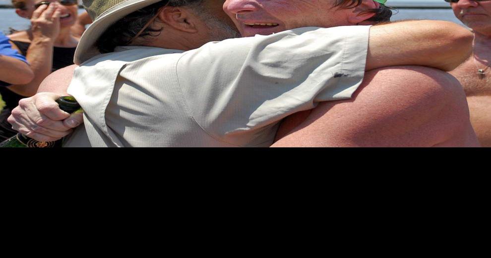 Man completes 25mile swim across Lake Pontchartrain News