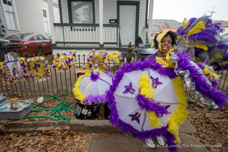Mardi Gras Indians meander through Central City in New Orleans on Super Sunday 2019