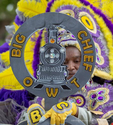 Mardi Gras Indians meander through Central City in New Orleans on Super Sunday 2019