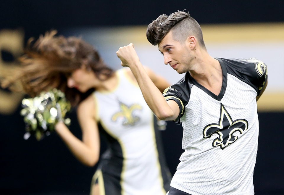 New Orleans Saints cheerleader Jesse Hernandez, a member of the  Saintsations, dances in the first half of an NFL football game against the  Tampa Bay Buccaneers in New Orleans, Sunday, Sept. 9