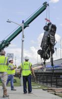 Mangled car pulled from New Orleans canal was reported lost in Katrina, documents show