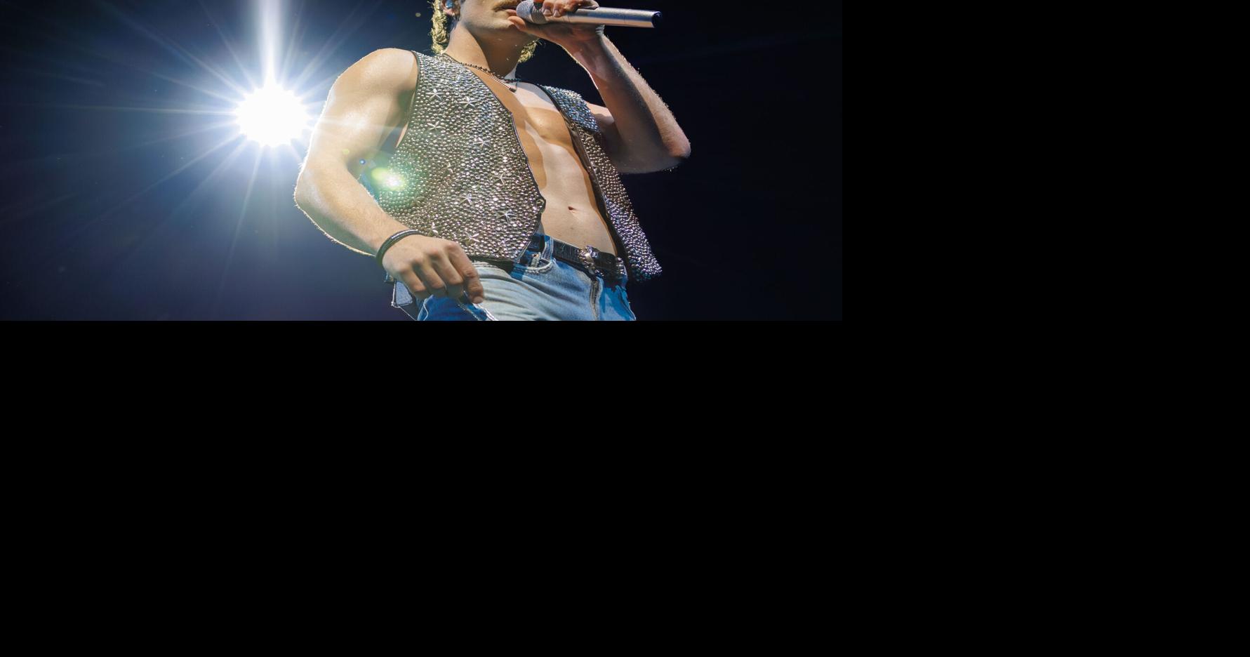 An energetic, athletic Benson Boone delivered a flippin' good show in New Orleans His 20-song set at the Smoothie King Center gave young fans lots of opportunities to sing along.