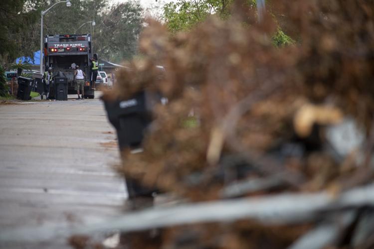 As stench rises from the streets after Hurricane Ida, trash and debris