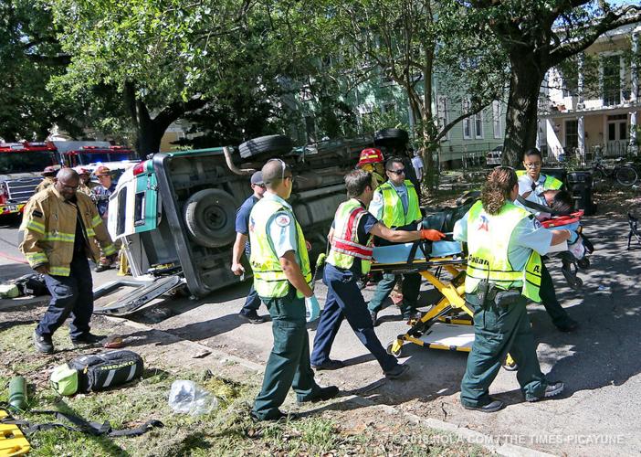 Medical transport van overturns in crash with SUV in Central City