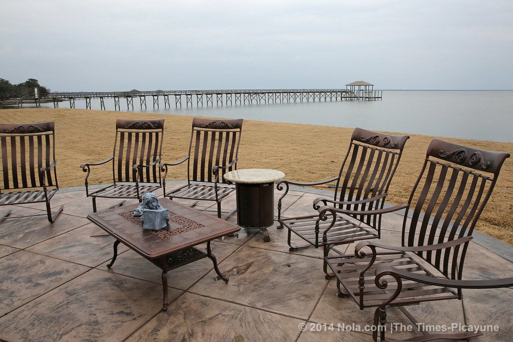 On the shores of Lake Pontchartrain, a Mandeville home sits on land