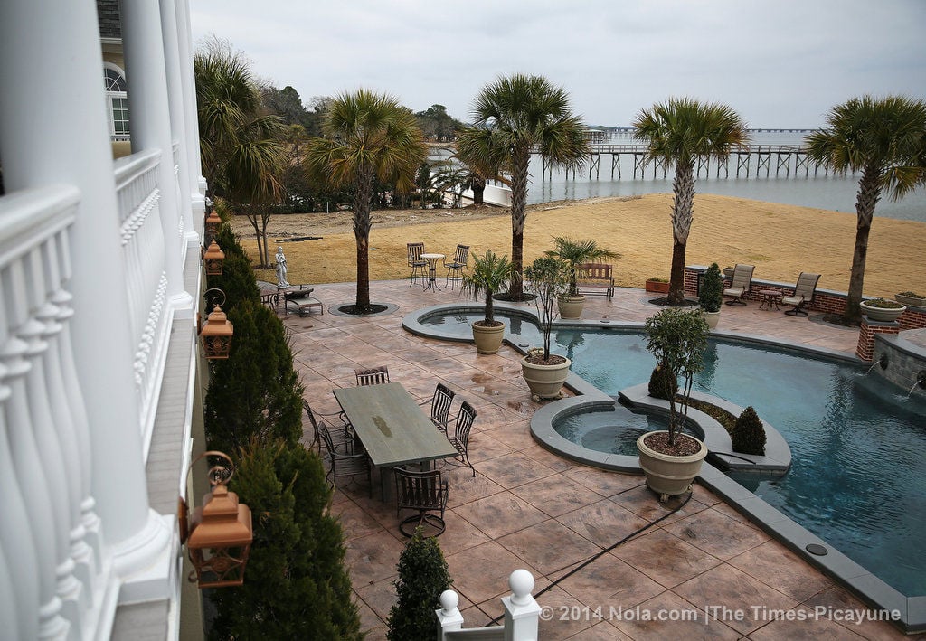 On the shores of Lake Pontchartrain, a Mandeville home sits on land