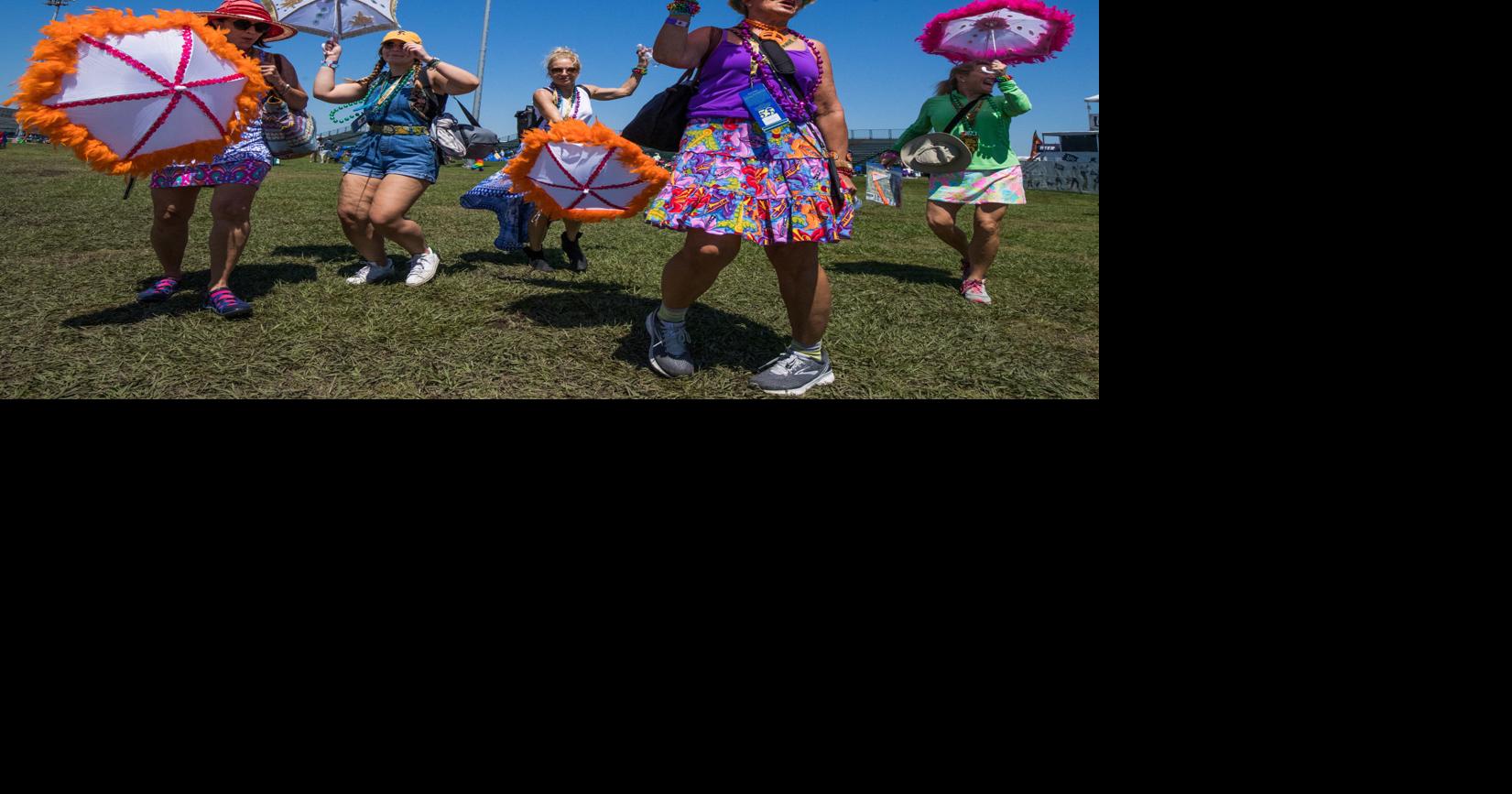 Photos Jazz Fest fans switch umbrellas for parasols on pictureperfect