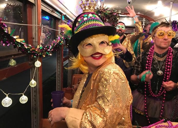 New Funky Uptown Krewe grooves on the St. Charles streetcar with DJ Mannie Fresh