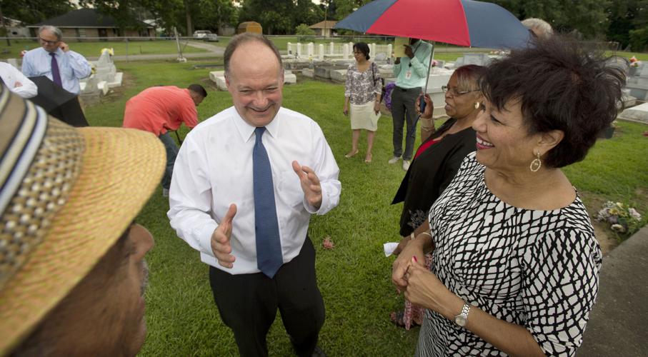 University president meets with descendants of slaves sold