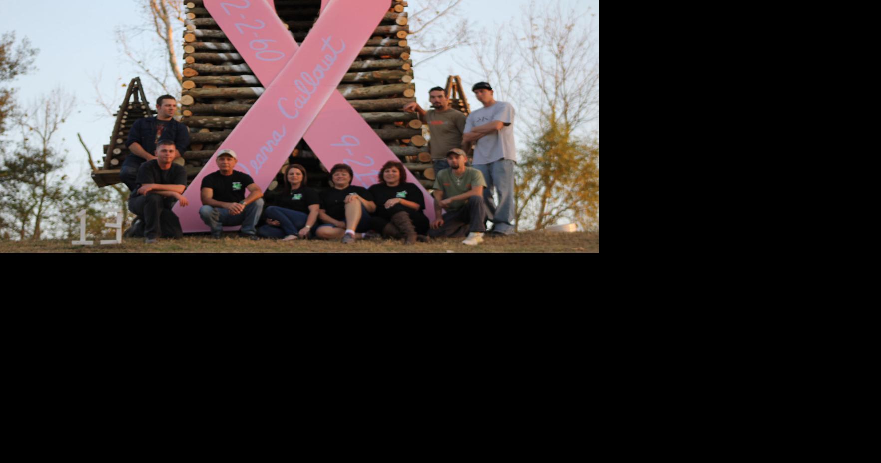 Pink ribbon bonfire among structures going up in flames in the River ...