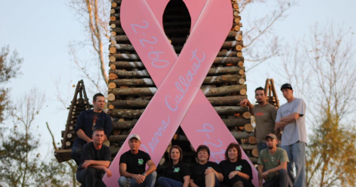 Pink Ribbon Explosion Pink ribbon bonfire among structures going up in flames in the River ...