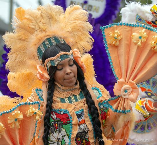 Mardi Gras Indians meander through Central City in New Orleans on Super Sunday 2019
