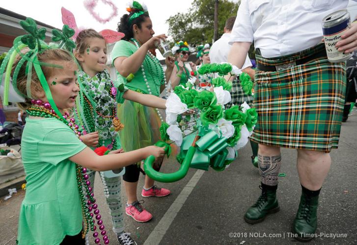 Irish Channel parade flows slowly down Magazine on St. Patrick's Day