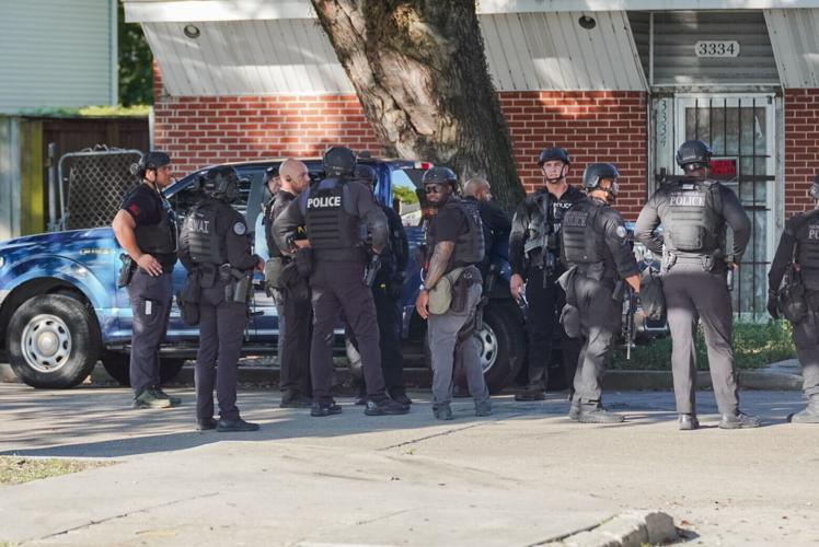 SWAT team rolls to man barricaded in Hoffman Triangle home | Crime ...