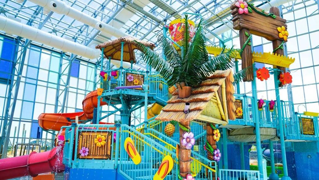 Lazy river, water slides Indoor water park with retractable roof opens