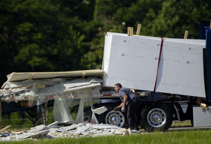 Traffic slow on eastbound I 12 after 18 wheeler loses granite load