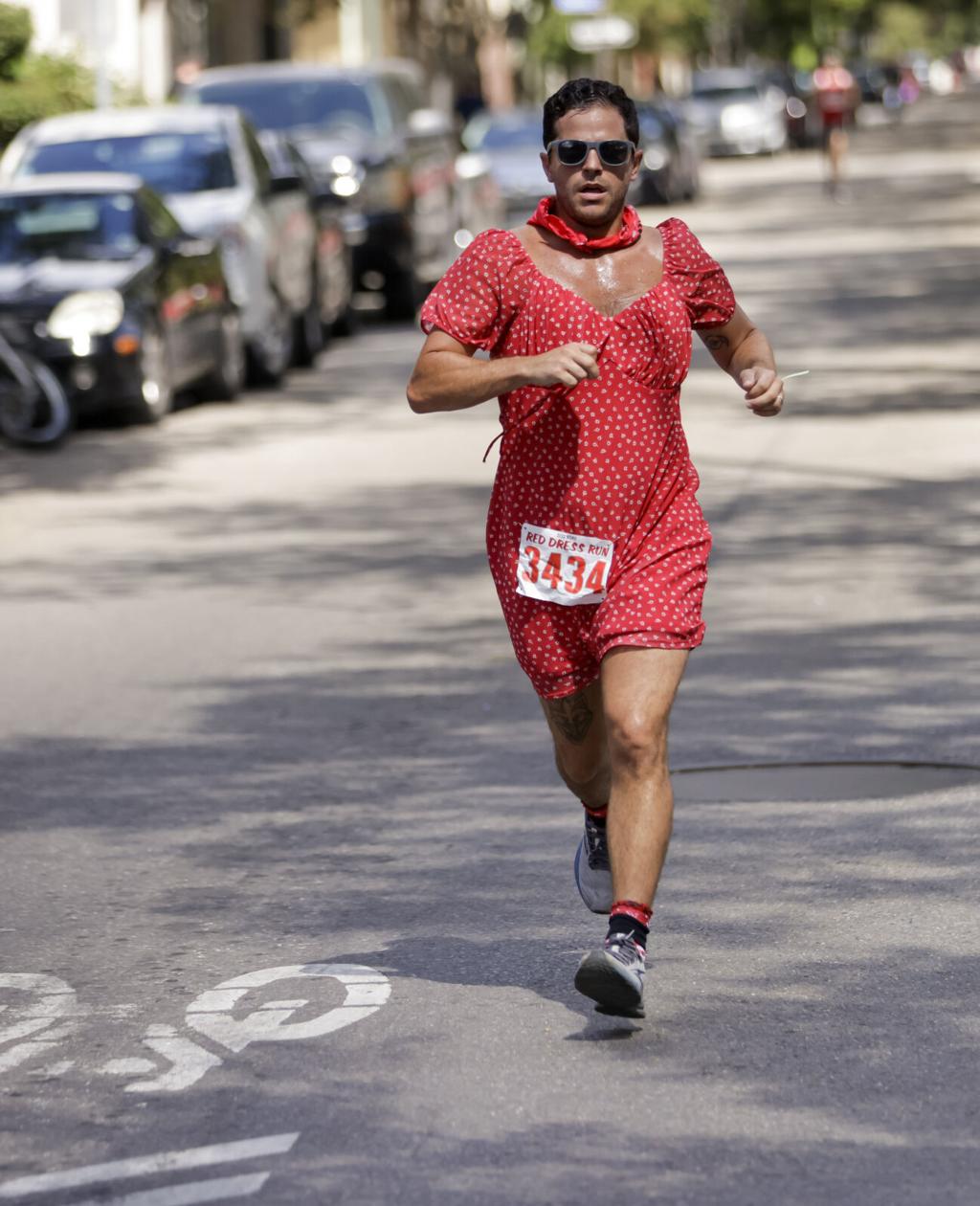 woman in red dress running