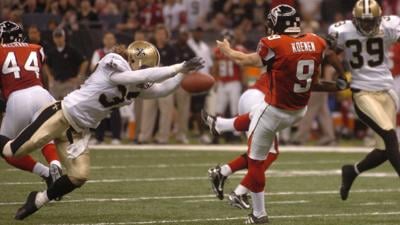The iconic block: Steve Gleason gets to Atlanta punter Michael Koenen
