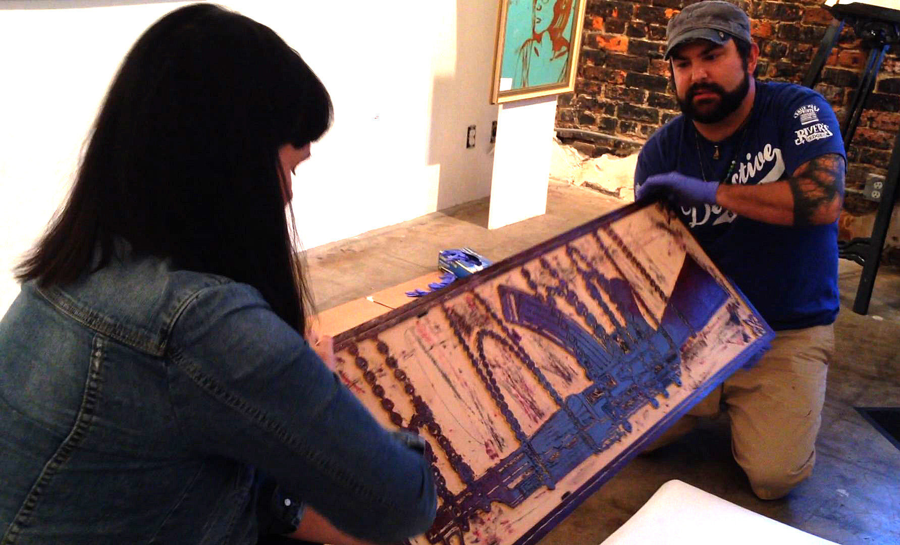 Conceptual artist/cop Charlie Hoffacker displays Mardi Gras