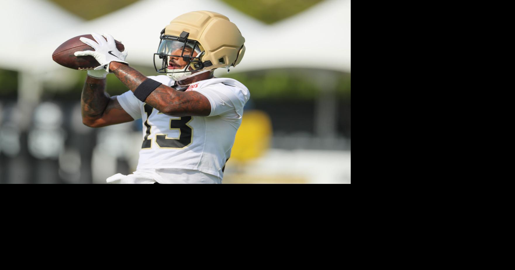 Ja'Lynn Polk running a drill at Saints training camp
