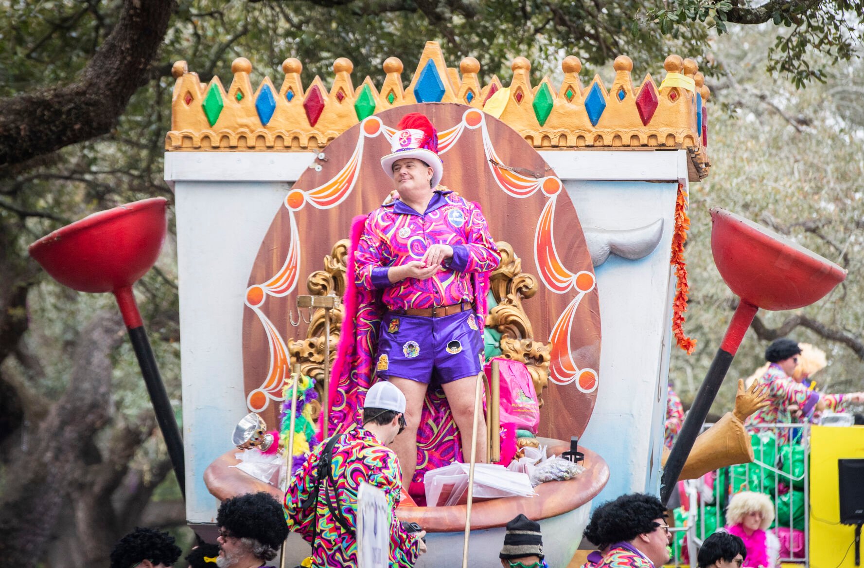 Photos Krewe of Tucks throws toilet paper, brushes and plungers on the