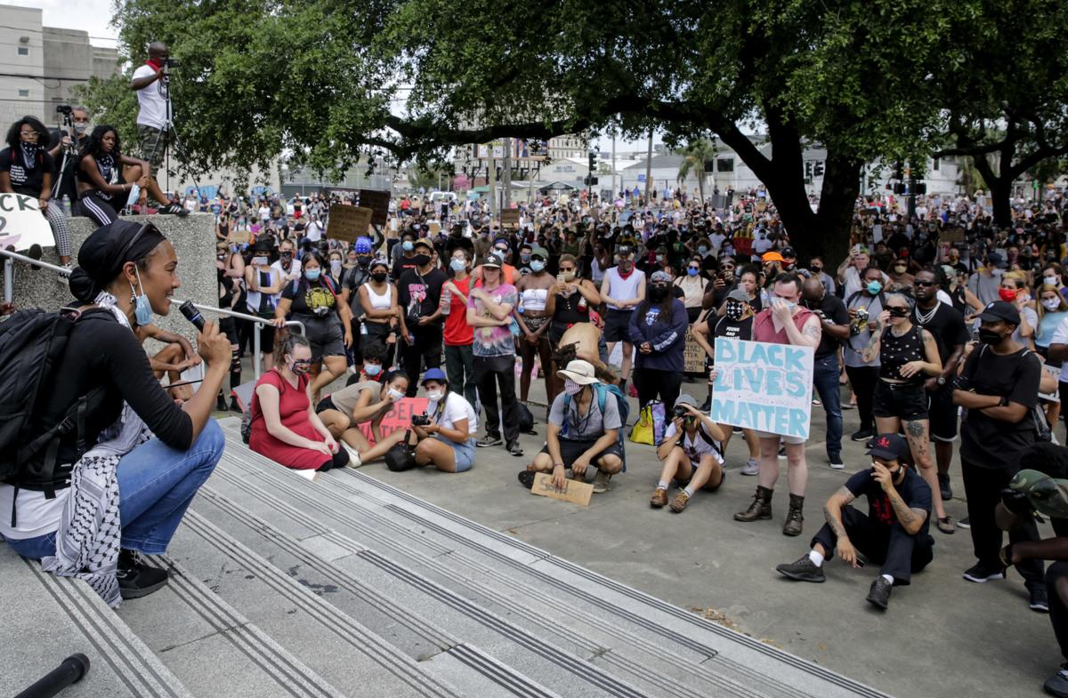 Protesters peacefully march in metro New Orleans in solidarity over