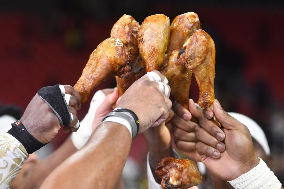 Photos, video Saints roast Falcons, chow down on turkey to celebrate