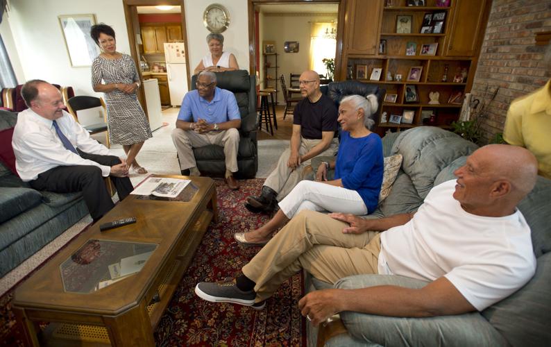 University president meets with descendants of slaves sold