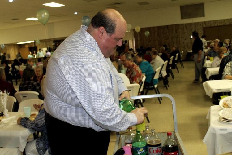 Westwego Police Chief Dwayne 'Poncho' Munch serves senior citizens