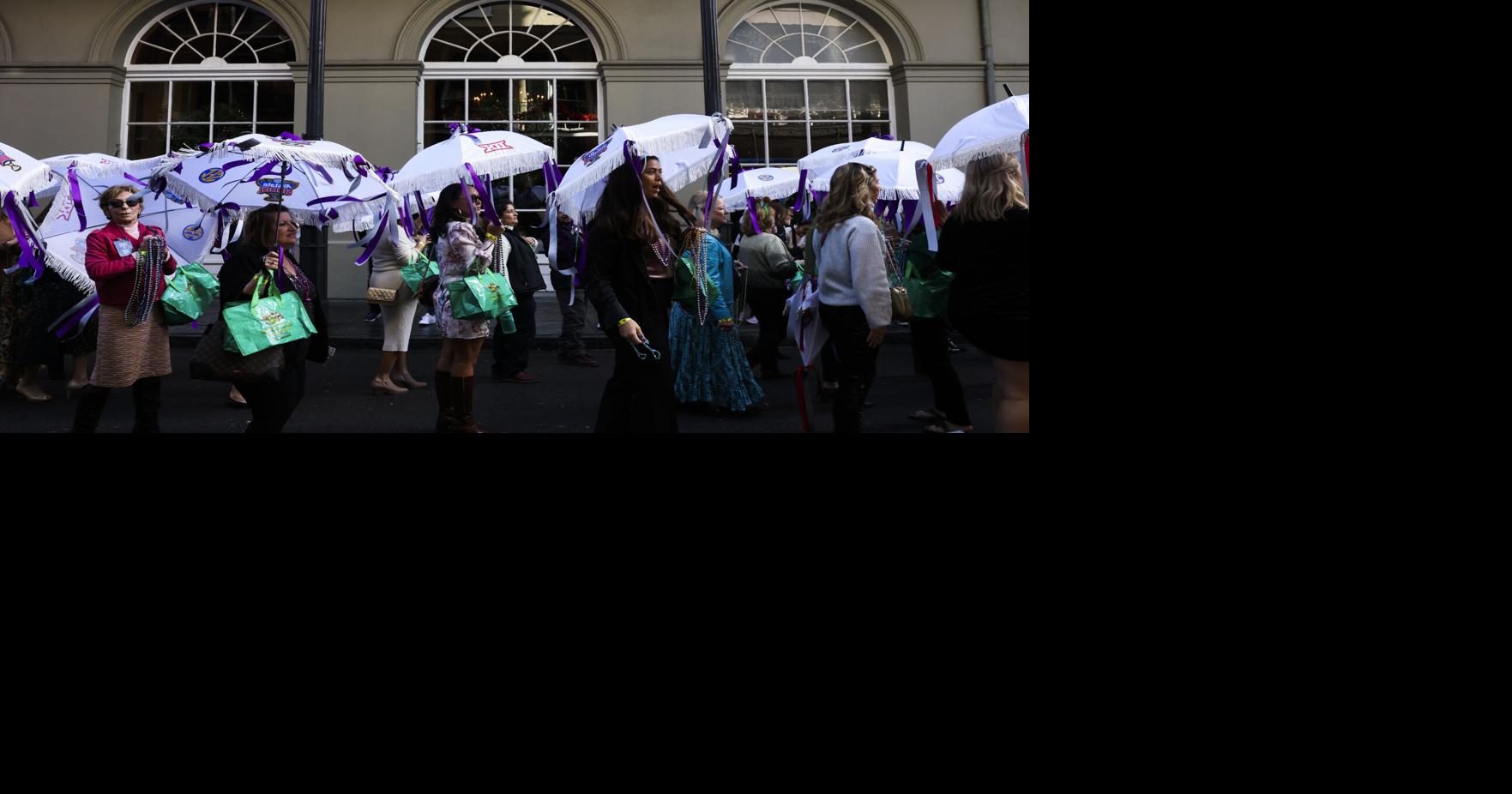 Allstate Sugar Bowl Committee second line in French Quarter Photos
