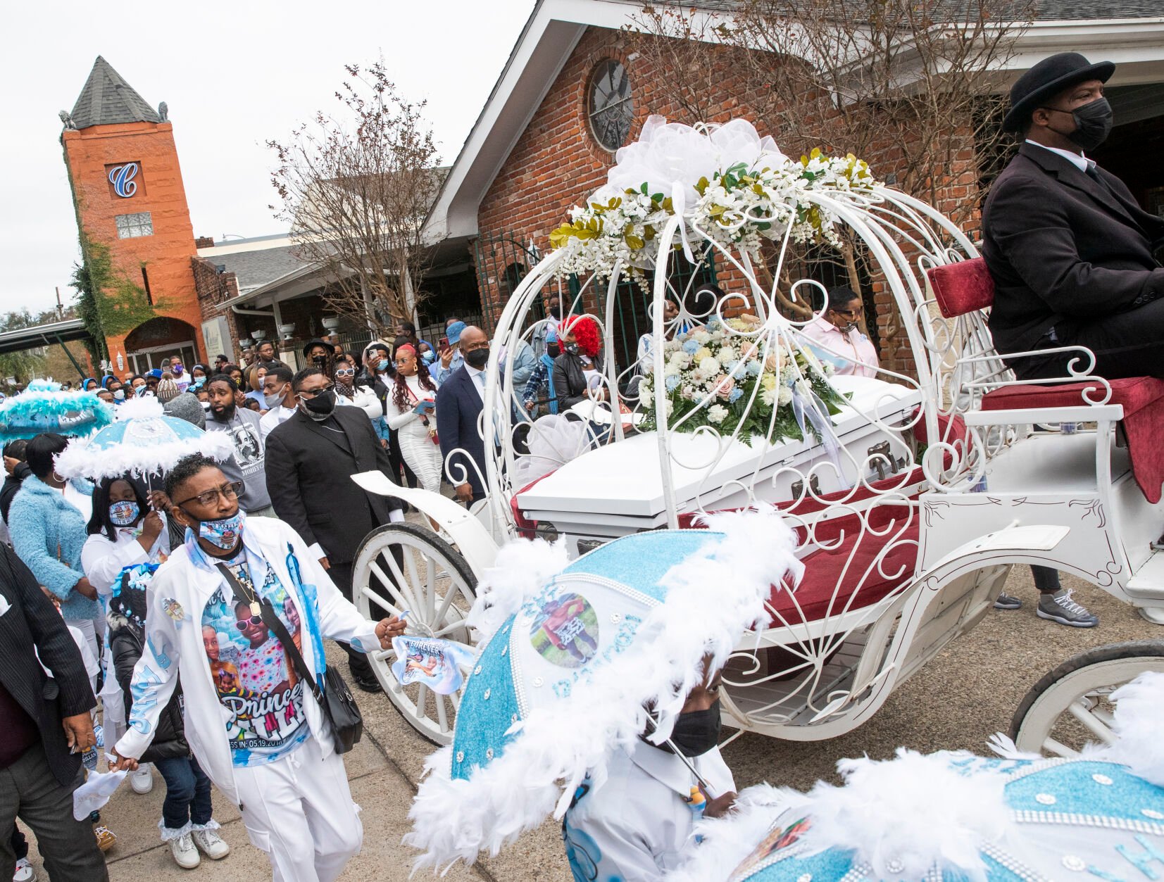 Photos 7 year old Dillan Burton is laid to rest after second line